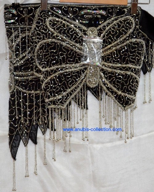 Conjunto mariposa fajín largo.